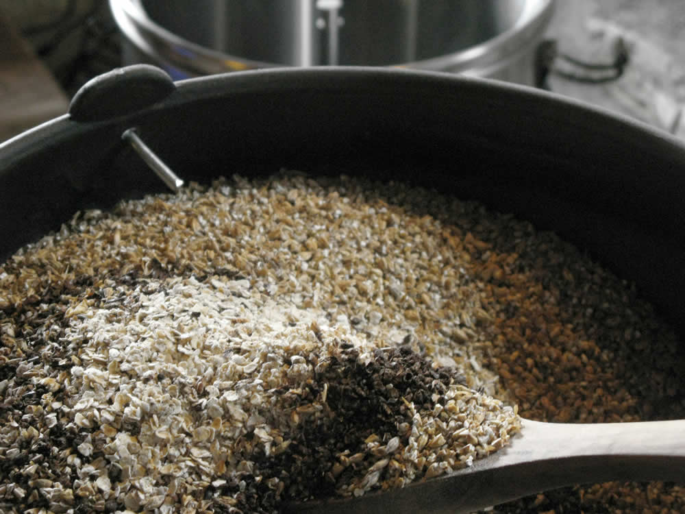 mixing the grains in before mashing | BEER'D artisan micro-brewery in Greece